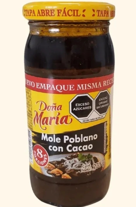 Seasoning Mexican mole poblano with cacao