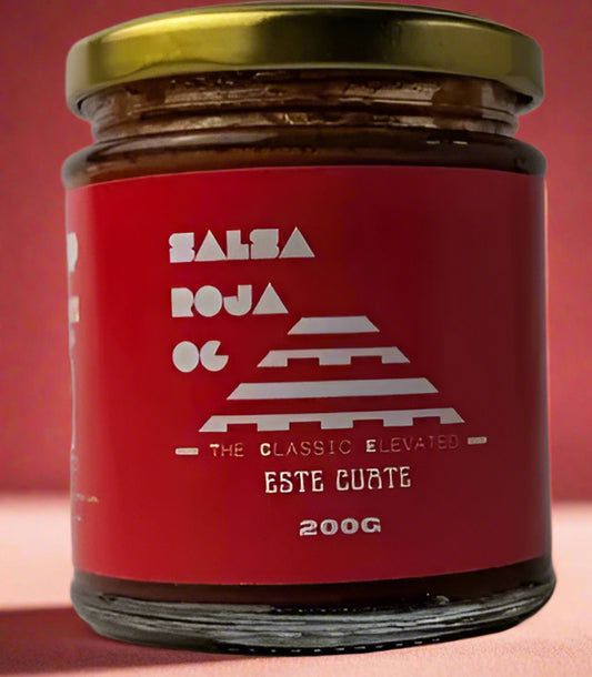 Jar of salsa roja with red label and gold lid Este cuate mexican brand